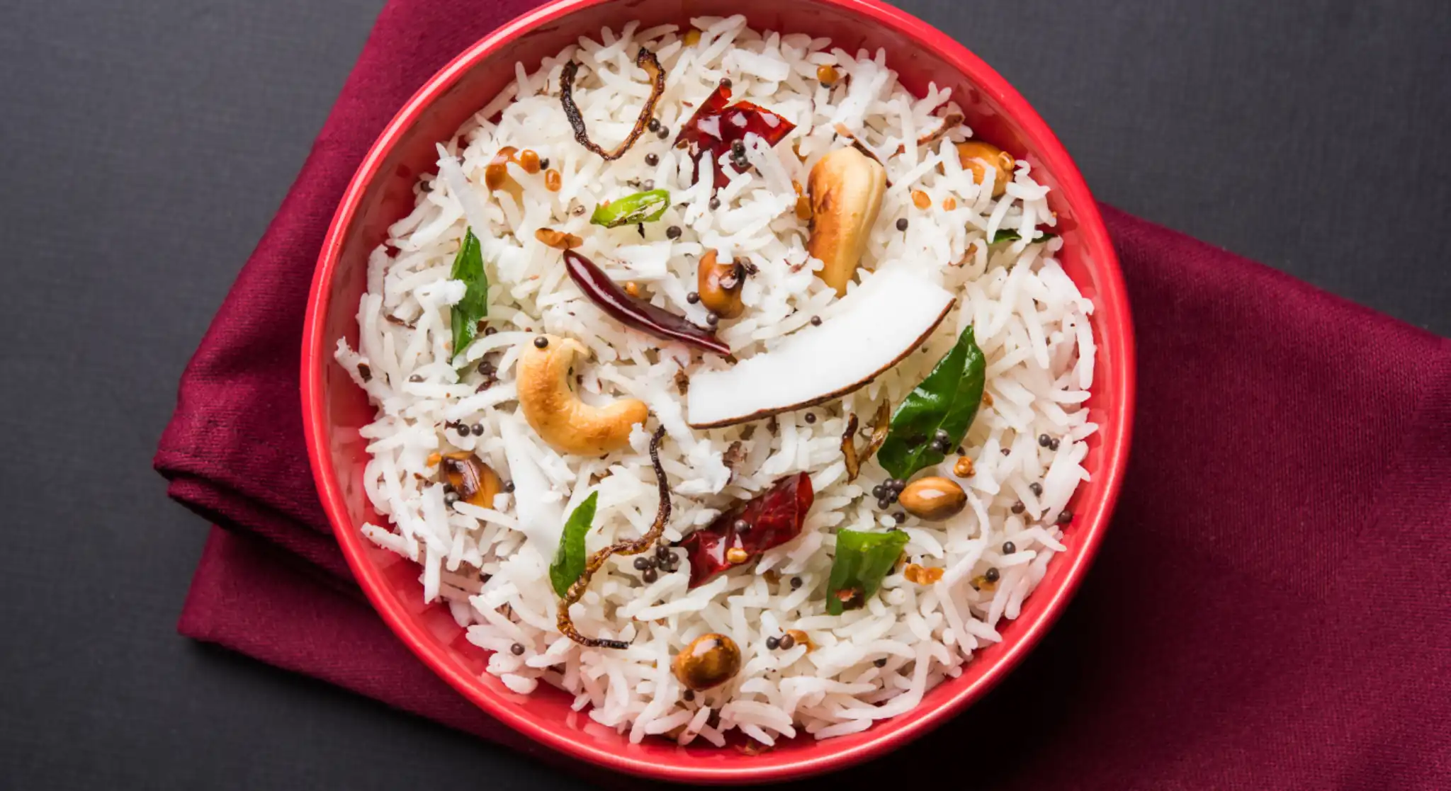 Coconut rice with cashews, curry leaves and spices