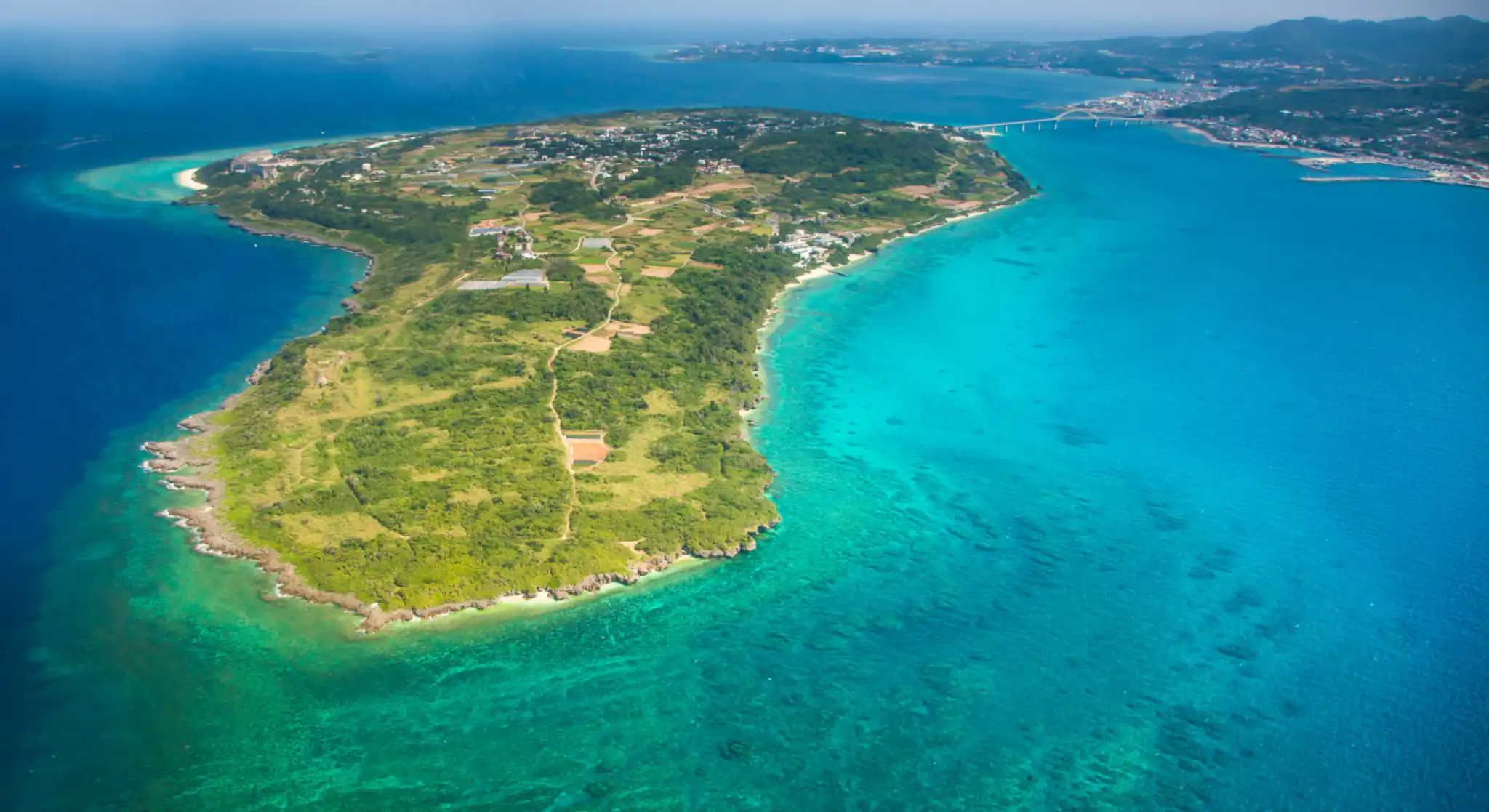Aerial skyline view of Abu Dhabi city and Corniche beach