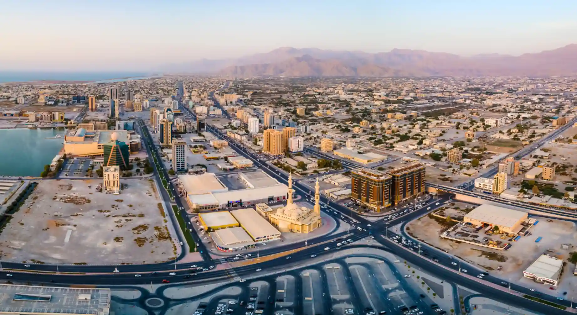 Aerial city view of Ras Al Khaimah highlighting why locals choose it for weekend adventures near Dubai