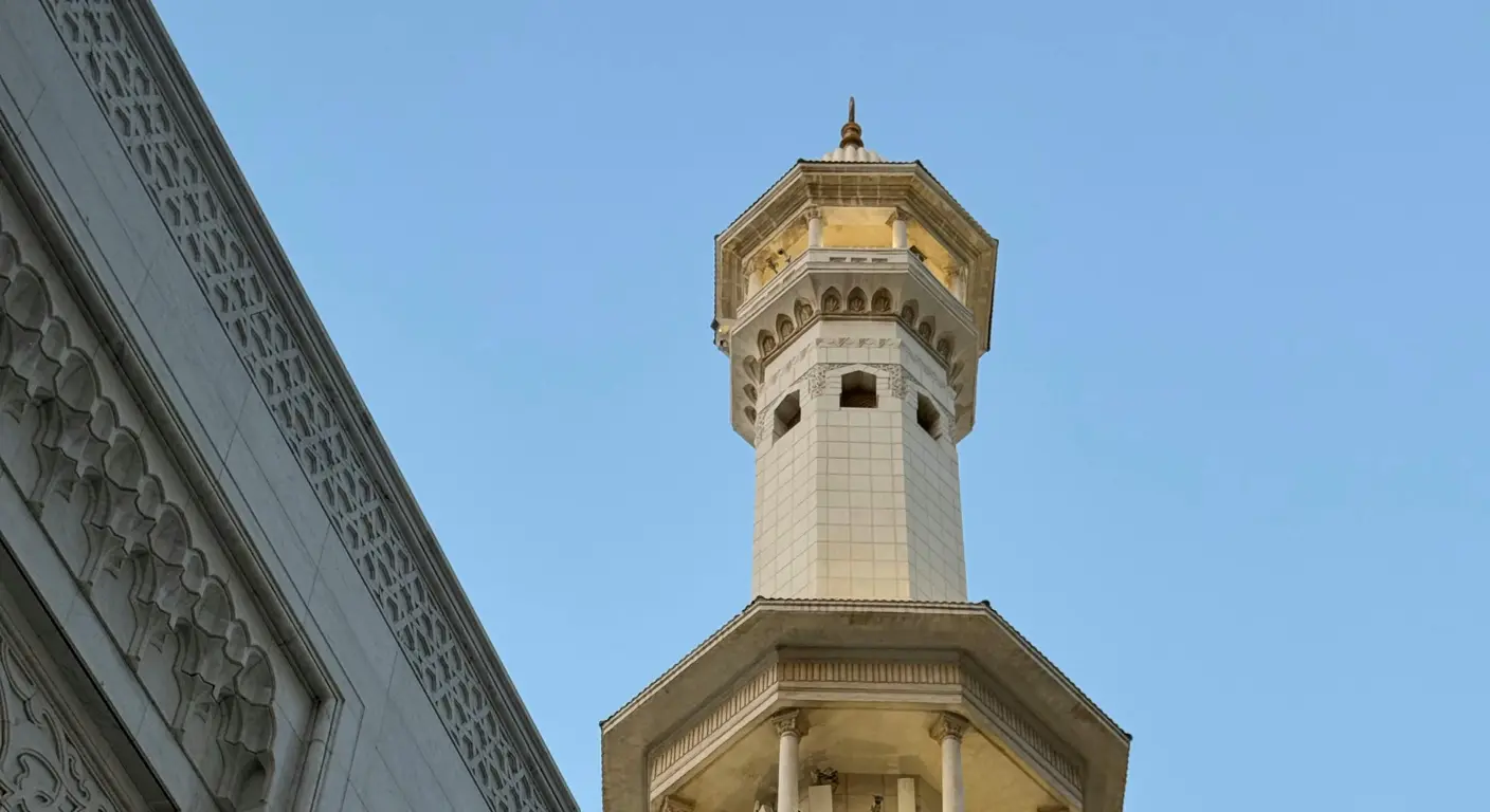 Sheikh Zayed Grand Mosque minaret detail against blue sky Abu Dhabi