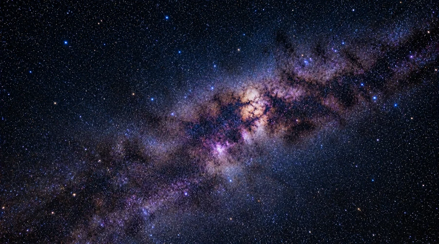 Bright Milky Way galactic core above a sand dune at Al Quaa desert