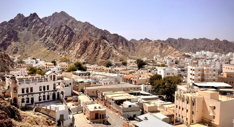 Muscat city neighbourhood beneath the Hajar Mountains in Oman