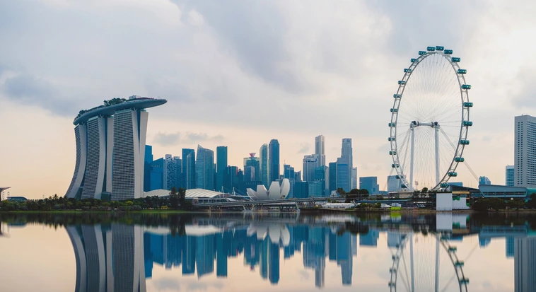 Marina Bay skyline with Marina Bay Sands and the Singapore Flyer reflected on the waterfront