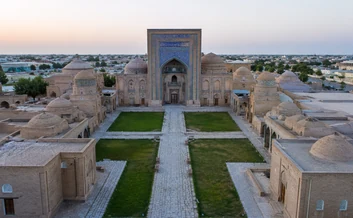 Historic madrasa courtyard and tiled portal in Bukhara, Uzbekistan