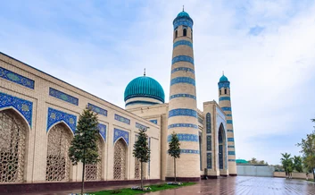 The blue-tiled mosque and minarets of the Hast Imam complex in Tashkent, Uzbekistan