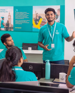 Jude Abraham leading a pre-departure operations briefing at the Arabiers Holidays office in Colombo, Sri Lanka & reviewing driver rosters, hotel holds, and route timings before guests arrive